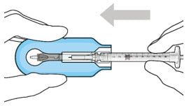 Push the syringe into the carrier.image