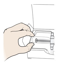 Place finger or thumb on edge of tray to secure it while you remove the syringe.image