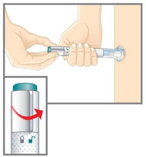 Place and hold the clear base flat and firmly against your skin. Turn the lock ring to the unlock position.image