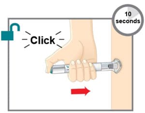 Press and hold the teal injection button; you will hear a loud click.image