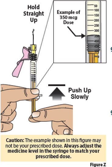 Hold syringe straight up and push up the plunger example image.image