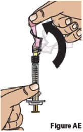 Carefully push the pink needle shield over the needle until it snaps into place and covers the needle (Figure AE).image