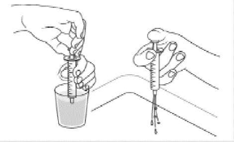 Clean the oral dosing dispenser after each use by placing in the dishwasher, or by rinsing with tap water.image