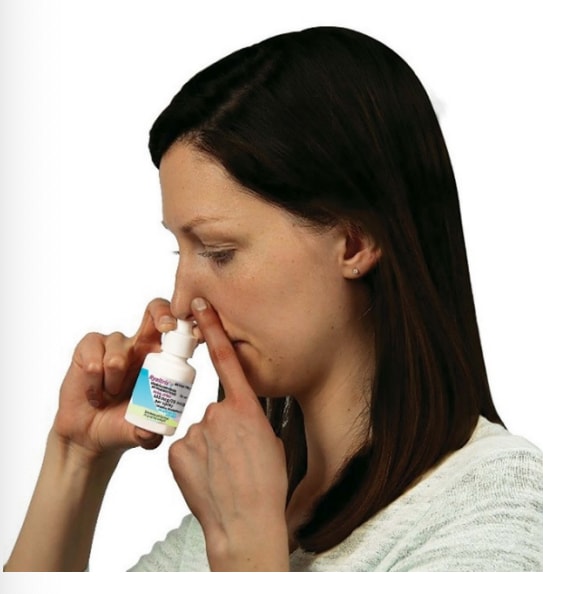 Hold 1 nostril closed with a finger. Insert the end of the Ryaltris spray pump tip into the other nostril, pointing it slightly toward the outside of the nose, away from the nasal septum .