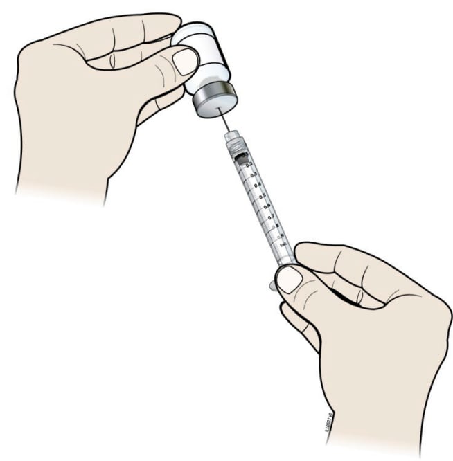 Keep the needle in the Releuko vial and turn the vial upside down.