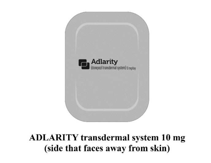 Image of the side of the Adlarity 10mg transdermal system that faces away from skin.