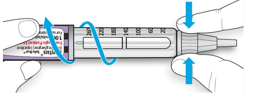 While gripping and squeezing the widest part of the needle cap, turn the Lantus SoloStar Pen several times with your other hand to remove the needle.