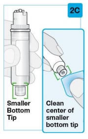 Clean the smaller bottom tip of the prefilled cartridge.