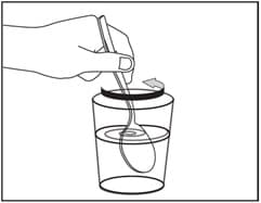 Stir the juice or milk containing the Emflaza oral suspension with a spoon. Mix well.