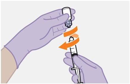 Unscrew the syringe from the Apretude vial adapter, holding the vial adapter. Keep syringe upright.