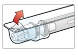 Pull corner of tab to open tray.