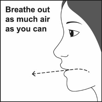 breathe out as much air as you can.image