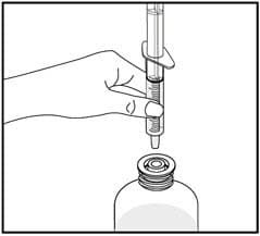 Turn the bottle back upright with the oral dispenser still in place. Remove the tip of the oral dispenser from the bottle adapter.