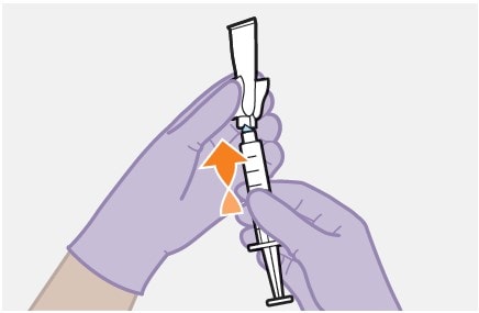 Remove the needle packaging from the Apretude needle.