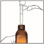 When you have measured the correct dose of Epidiolex, leave the oral syringe in the bottle adapter and turn the bottle right side up.