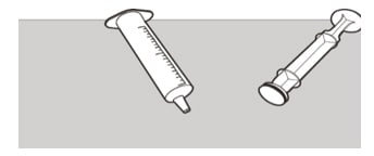 Check that the oral syringe barrel and plunger are clean. Place the oral syringe barrel and plunger on a clean surface in a safe place to dry.image