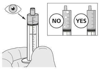 Hold the oral syringe with the syringe tip pointing up. Check the Evrysdi in the oral syringe. If there are large air bubbles in the oral syringe.image