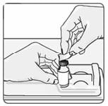 Place the vial back in the vial holder.  6. Use an alcohol wipe to clean the top of the vial (Figure 6). Wipe in one direction only.image