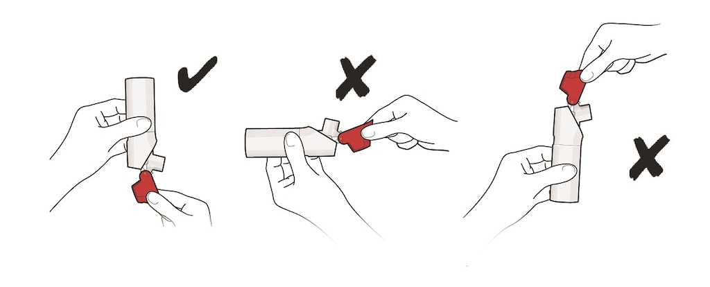 Hold you ProAir RespiClick inhaler upright as you open the red cap.