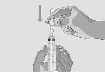 Once the needle is covered, push the needle cap towards the syringe to fully attach it with one hand to prevent an accidental stick with the needle.image