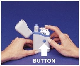 Figure P. image - cartridge pack will click into place when the 2 buttons show through the holes