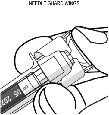 Inject all of the liquid by using your thumb to push in the plunger until the plunger head is completely between the needle guard wings. image