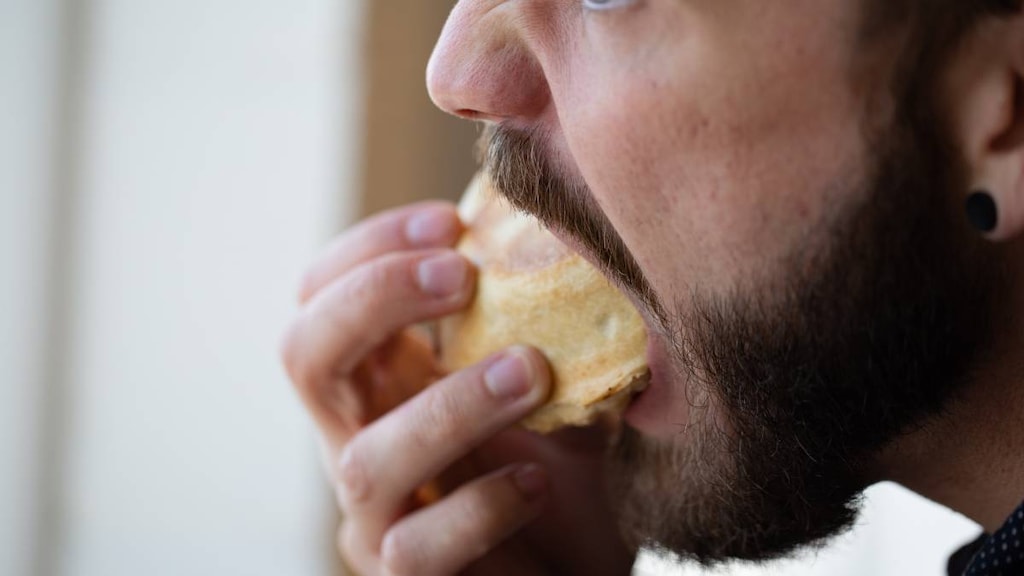 A man binging on food