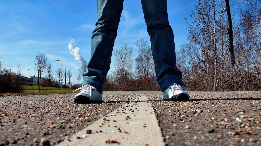 Standing on road