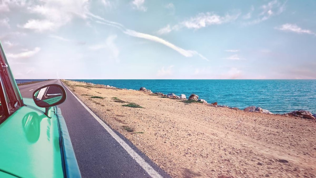 Car driving down a beach road -  COPD life expectancy.