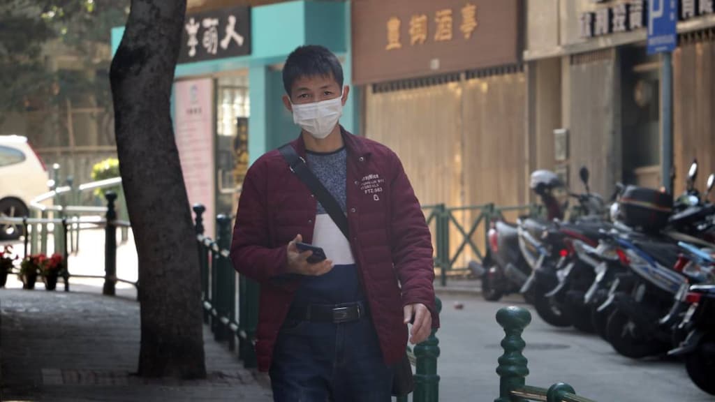 Man wearing a facemask when out