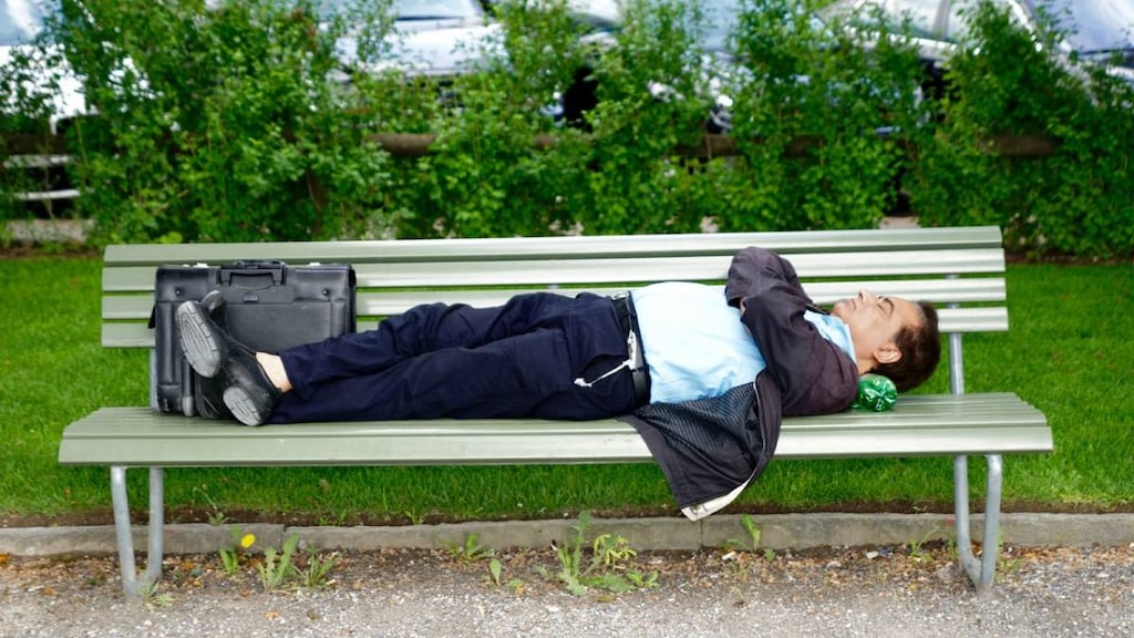 Man sleeping on bench