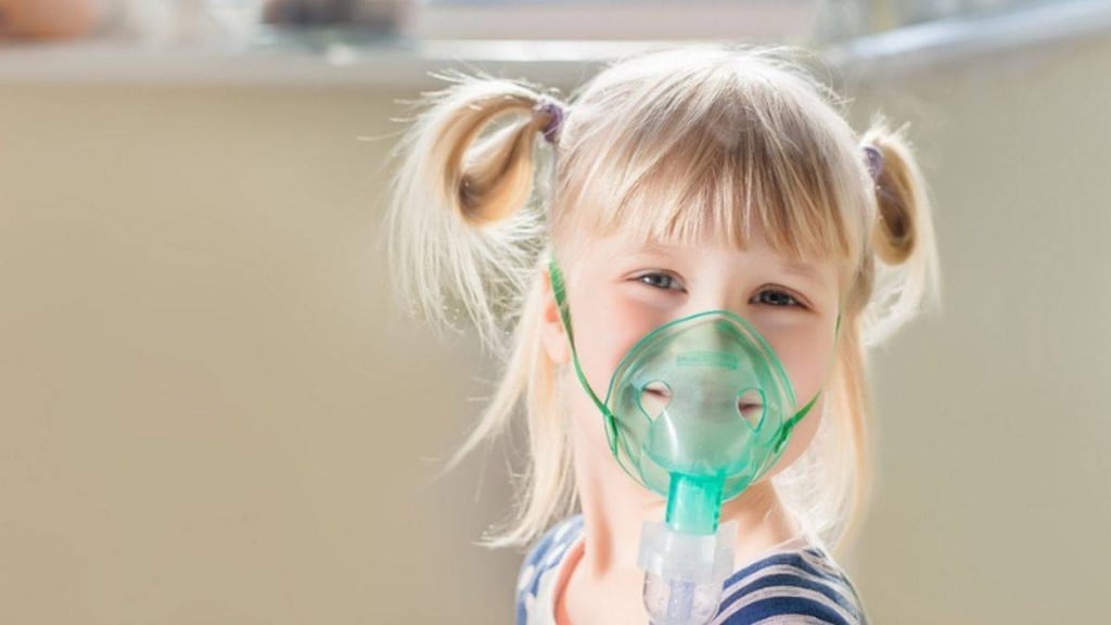 Child using a nebulizer for asthma