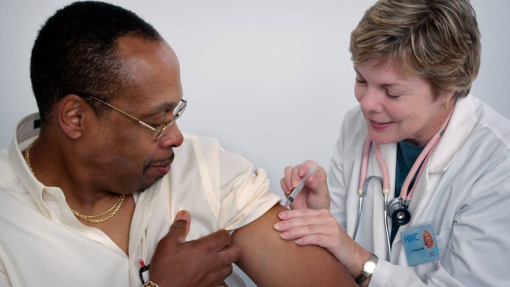 Nurse giving a vaccine