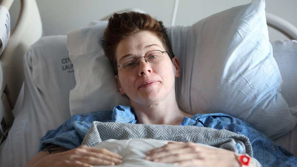 Woman in hospital bed