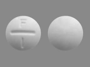 Image 1 - Imprint F 1 - Fluoritab 1.1 mg (equiv. fluoride 0.5 mg)