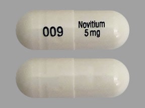Imprint 009 Novitium 5 mg - nitisinone 5 mg
