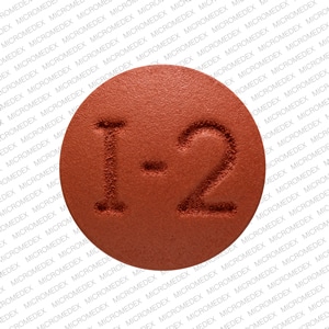 Pill Finder: I-2 Brown Round - Medicine.com