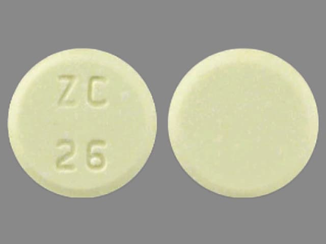 26 round. Round Yellow Pill 230 Imprint.