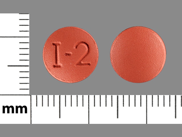 Pill Finder: I-2 Brown Round - Medicine.com